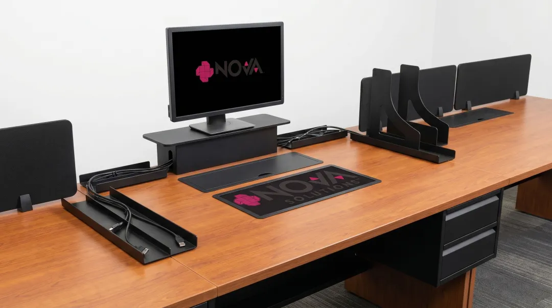NOVA Solutions retrofit kit components for monitor lift and power center furniture upgrades