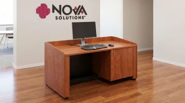 ADA-compliant accessible workstation with integrated wire management and clear floor space