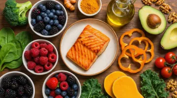 Colorful array of anti-inflammatory cruciferous vegetables berries and omega-3 rich foods
