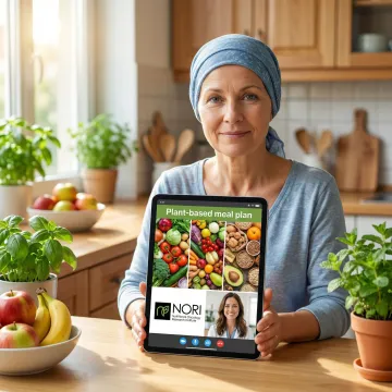 Cancer patient reviewing a personalized nutrition plan with a health advisor during a virtual consultation.