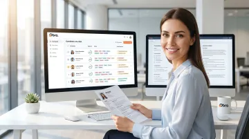 Recruiter reviewing AI candidate shortlist on screen while considering qualitative candidate context