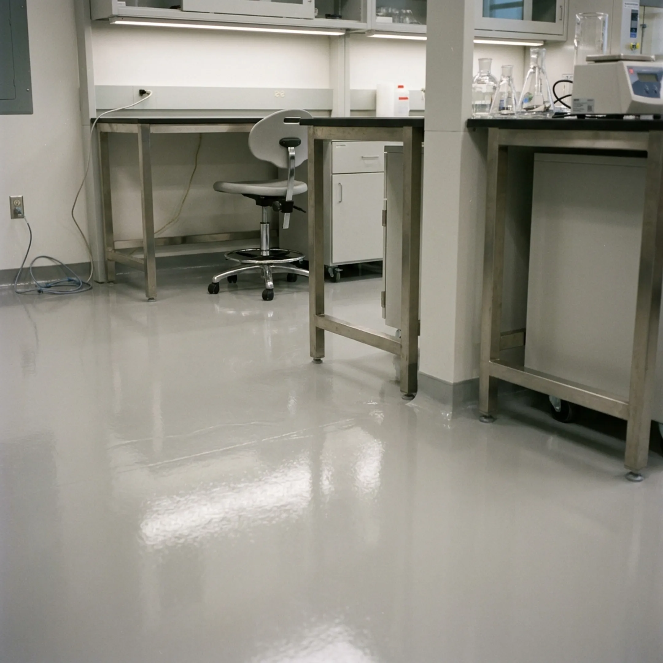 Newly installed seamless epoxy laboratory floor in active technical testing facility