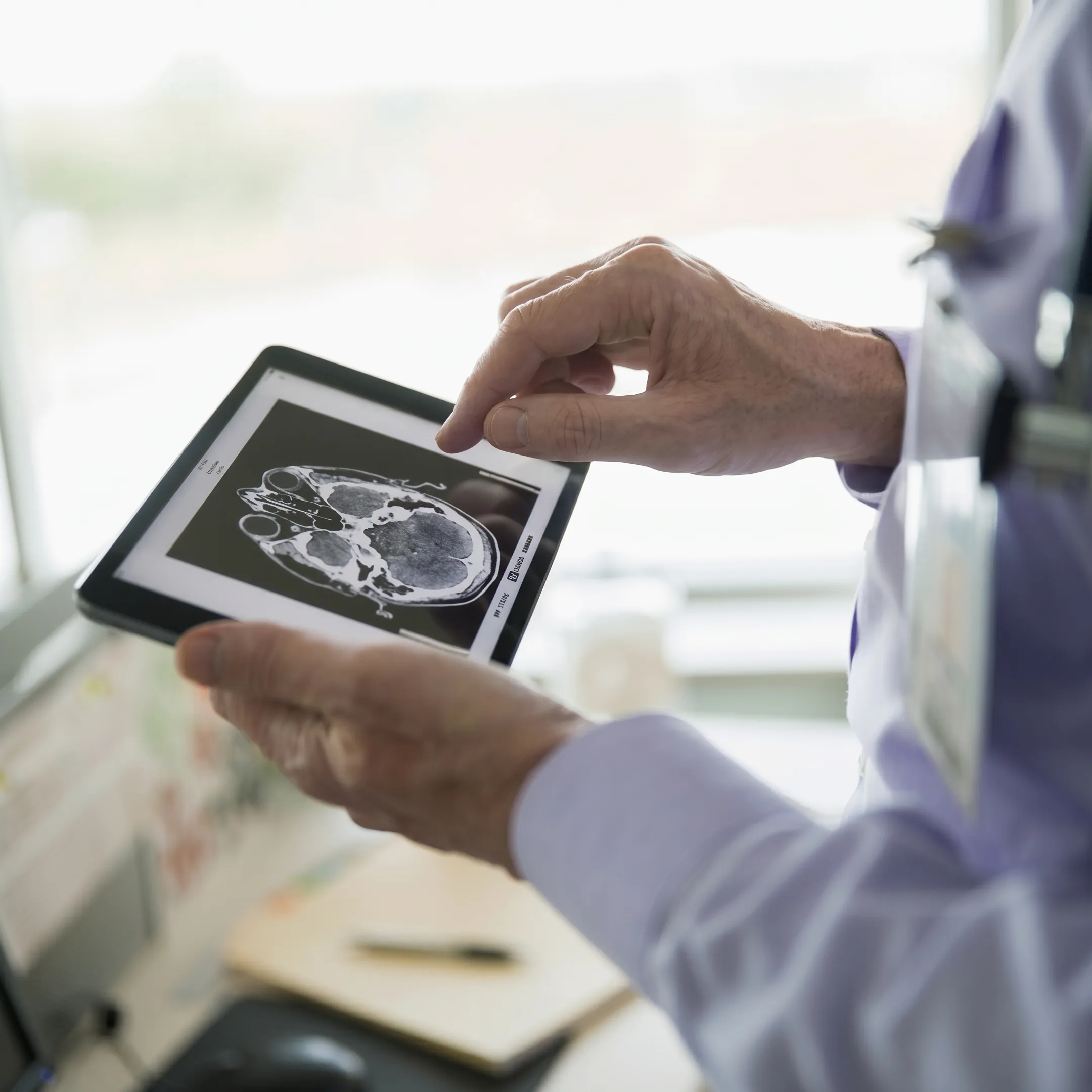 Personal injury attorney consulting with an injured client in a Florida law office