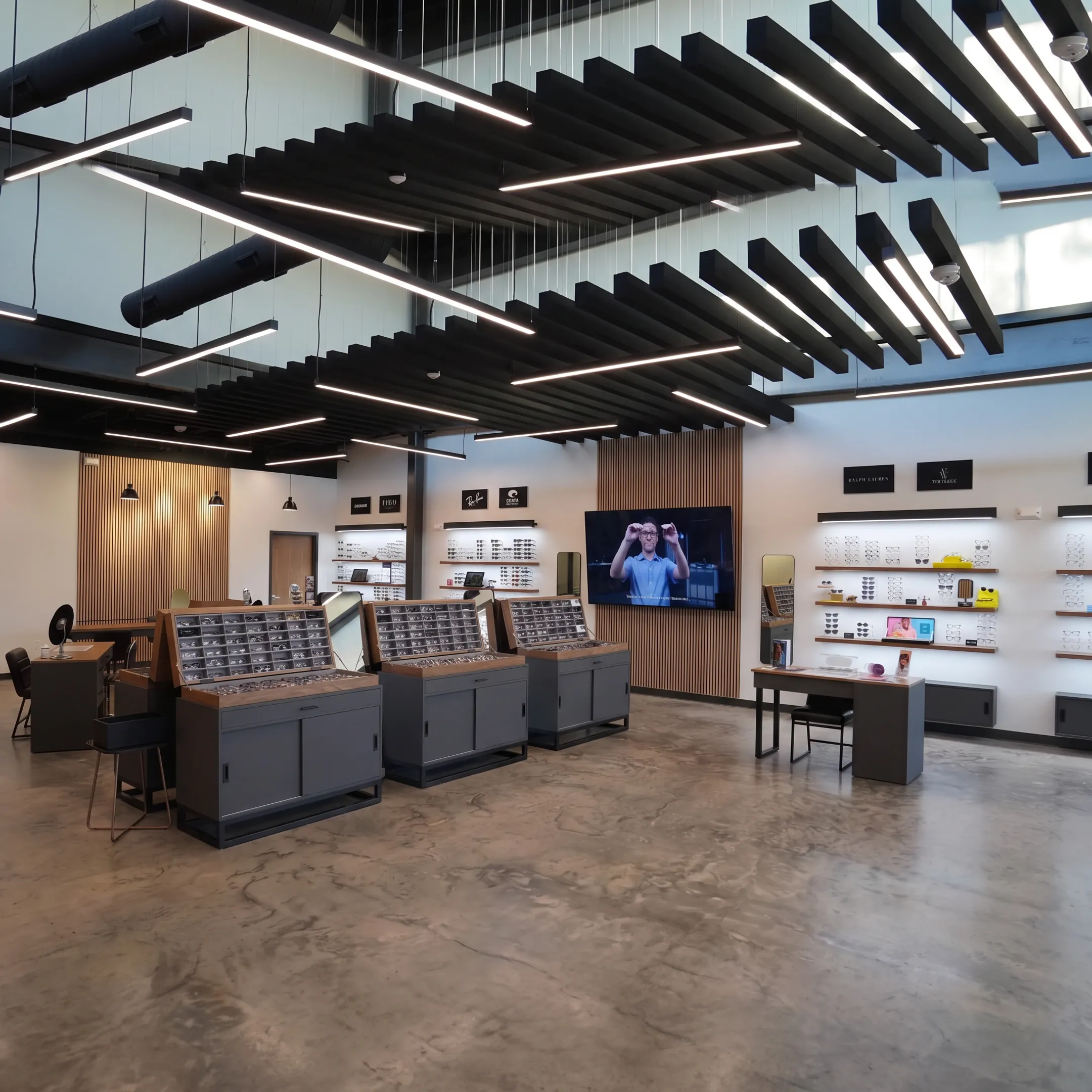 Modern optical retail interior with curated eyewear displays and branded signage