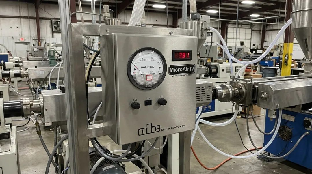 OLC MicroAir IV ultra-low pressure regulator installed on tubing extrusion line