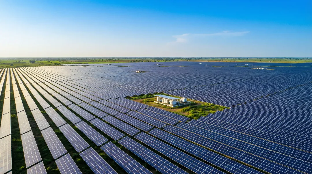Solar farm large scale utility renewable energy installation India open field