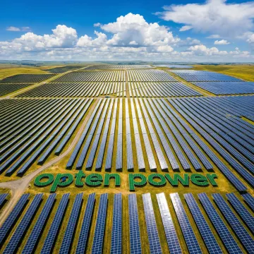 Aerial view of Nyngan Solar Farm with large-scale photovoltaic panels under clear skies