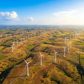 Wind turbines operating across Maharashtra's landscape for clean energy generation