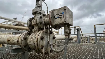 OSI optical scintillation sensor installed at industrial stack monitoring gas flow measurement
