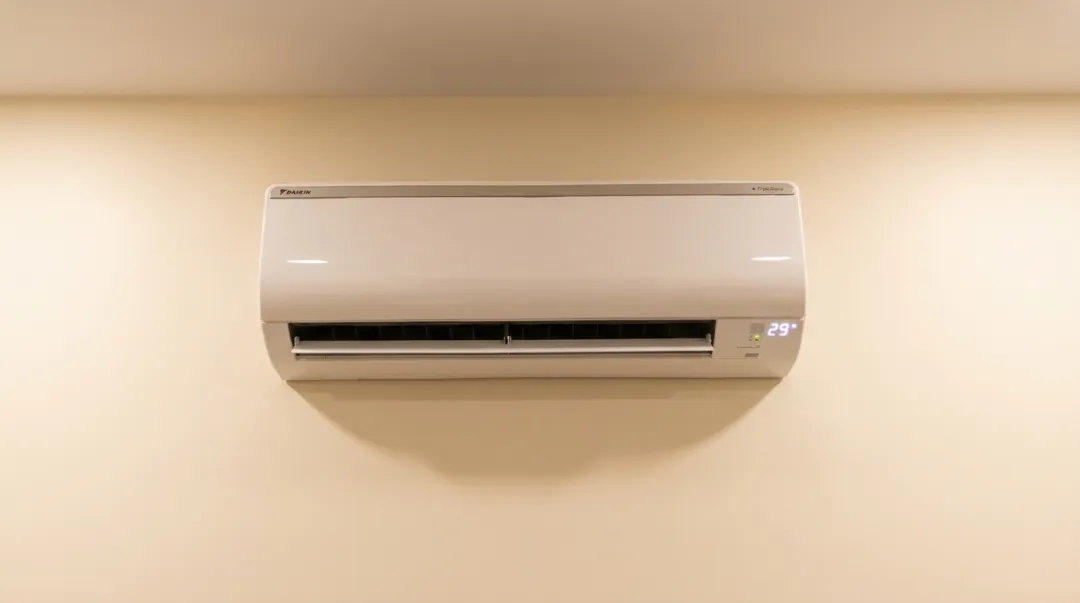 Daikin inverter split AC indoor unit with triple LED display showing power and temperature readings
