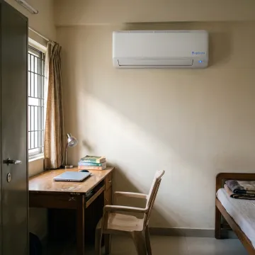 Split AC installed in a hostel or PG room