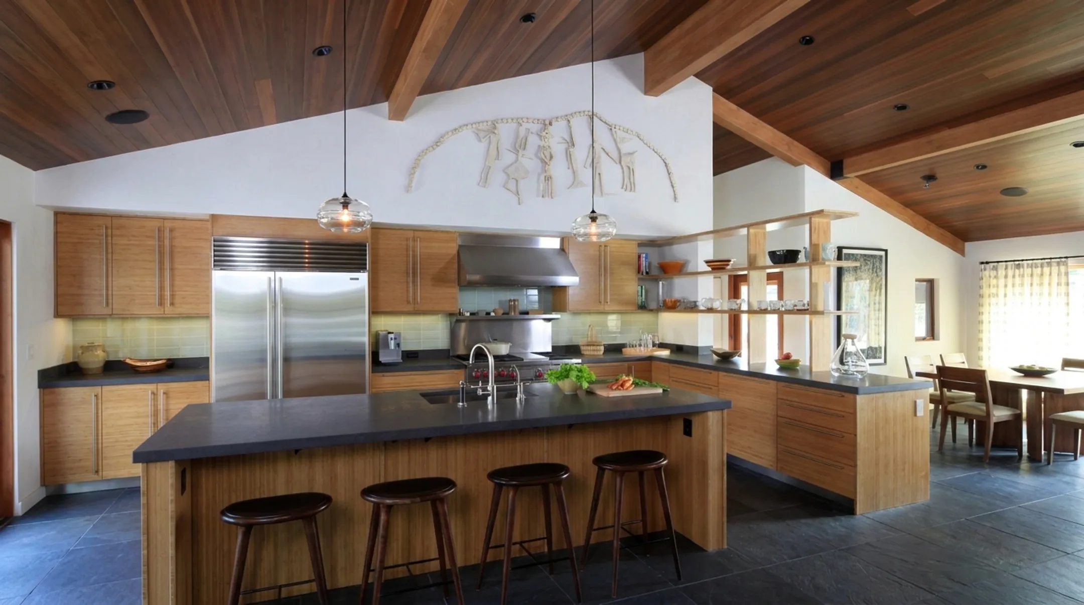 Crestmoore Place kitchen with tall storage units and glass-front cabinets