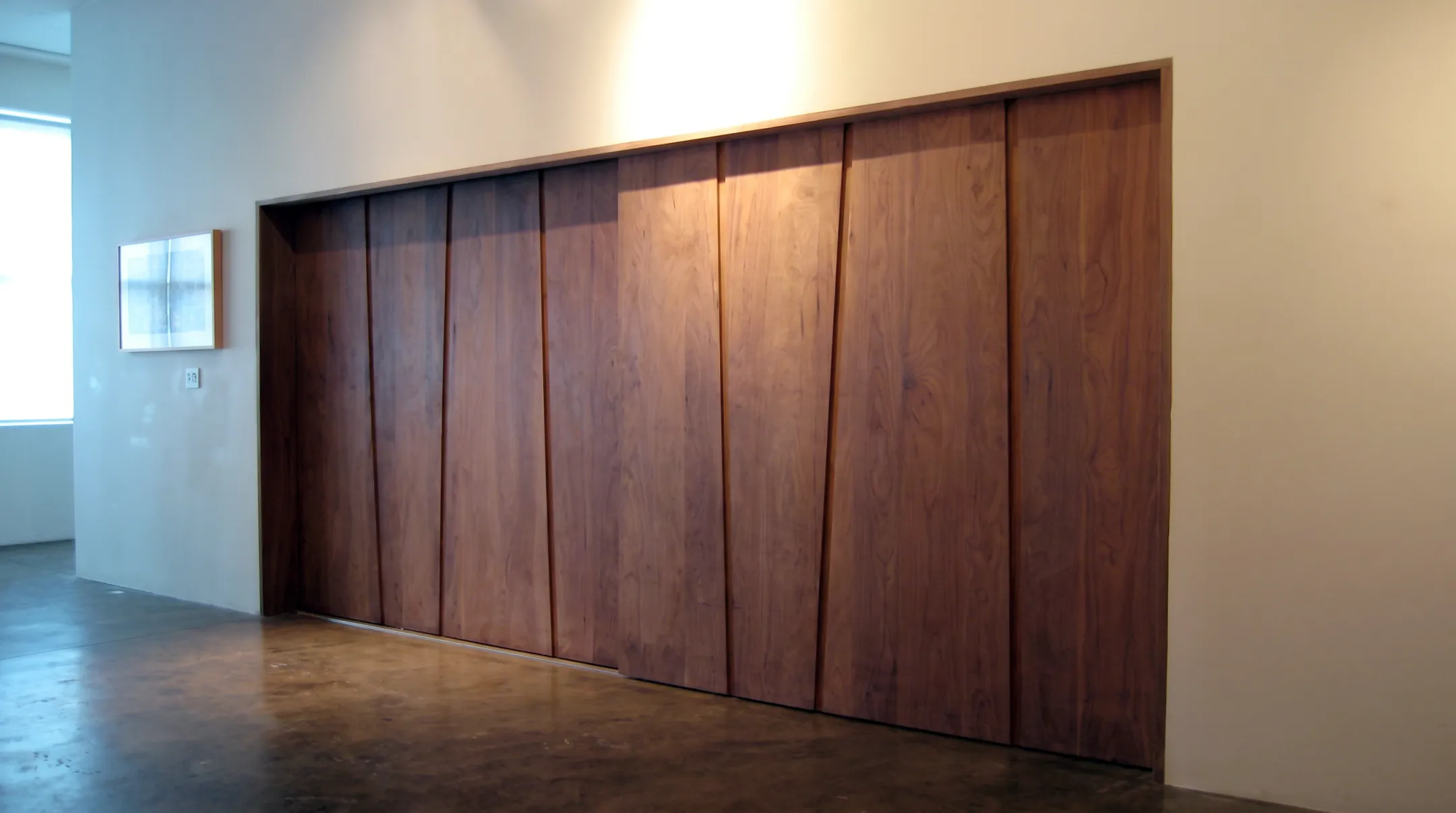 Custom built-in wardrobe cabinetry installed in master bedroom closet