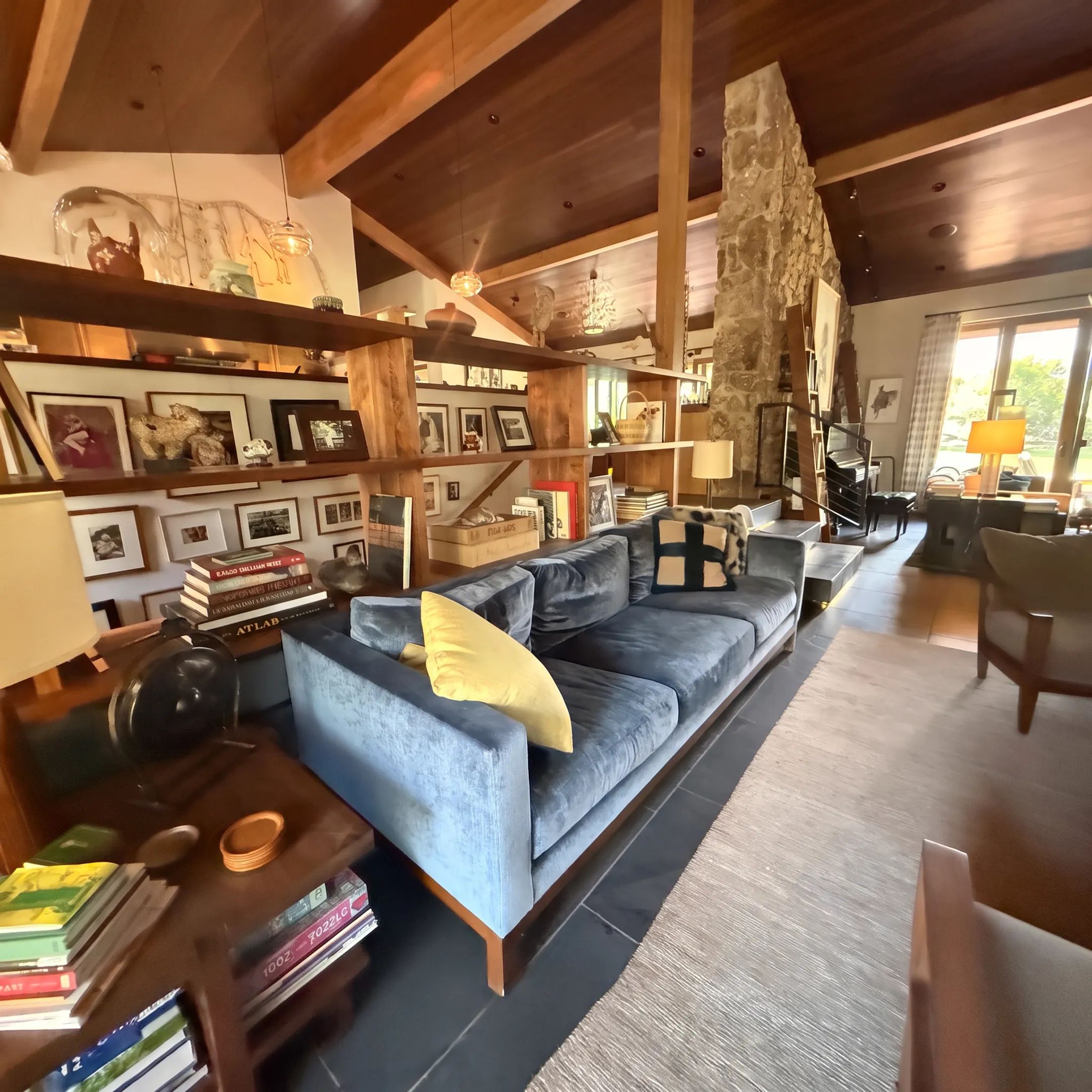 Architect-designed basement remodeling concept with seating, cabinetry, and natural finishes