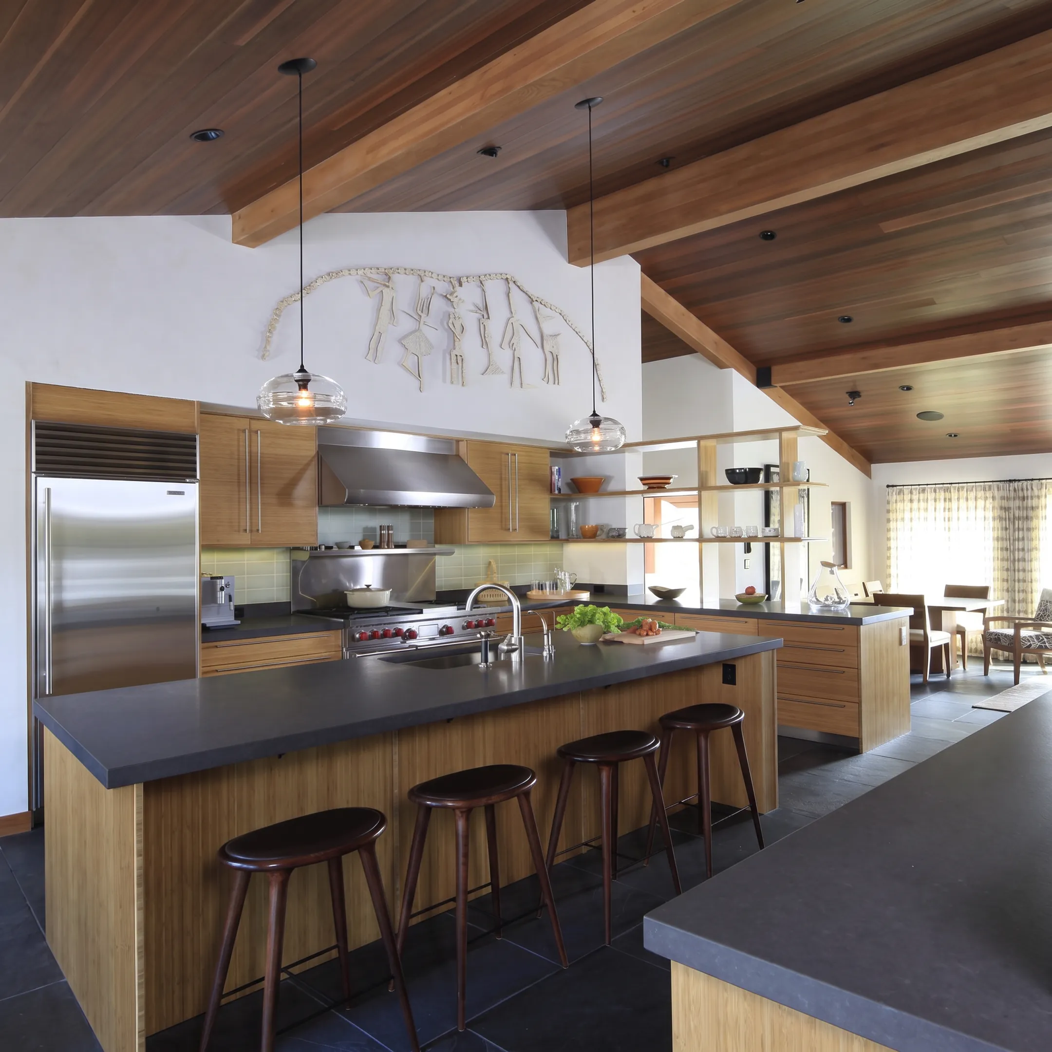Elegant small kitchen remodel with custom cabinetry and thoughtful natural light