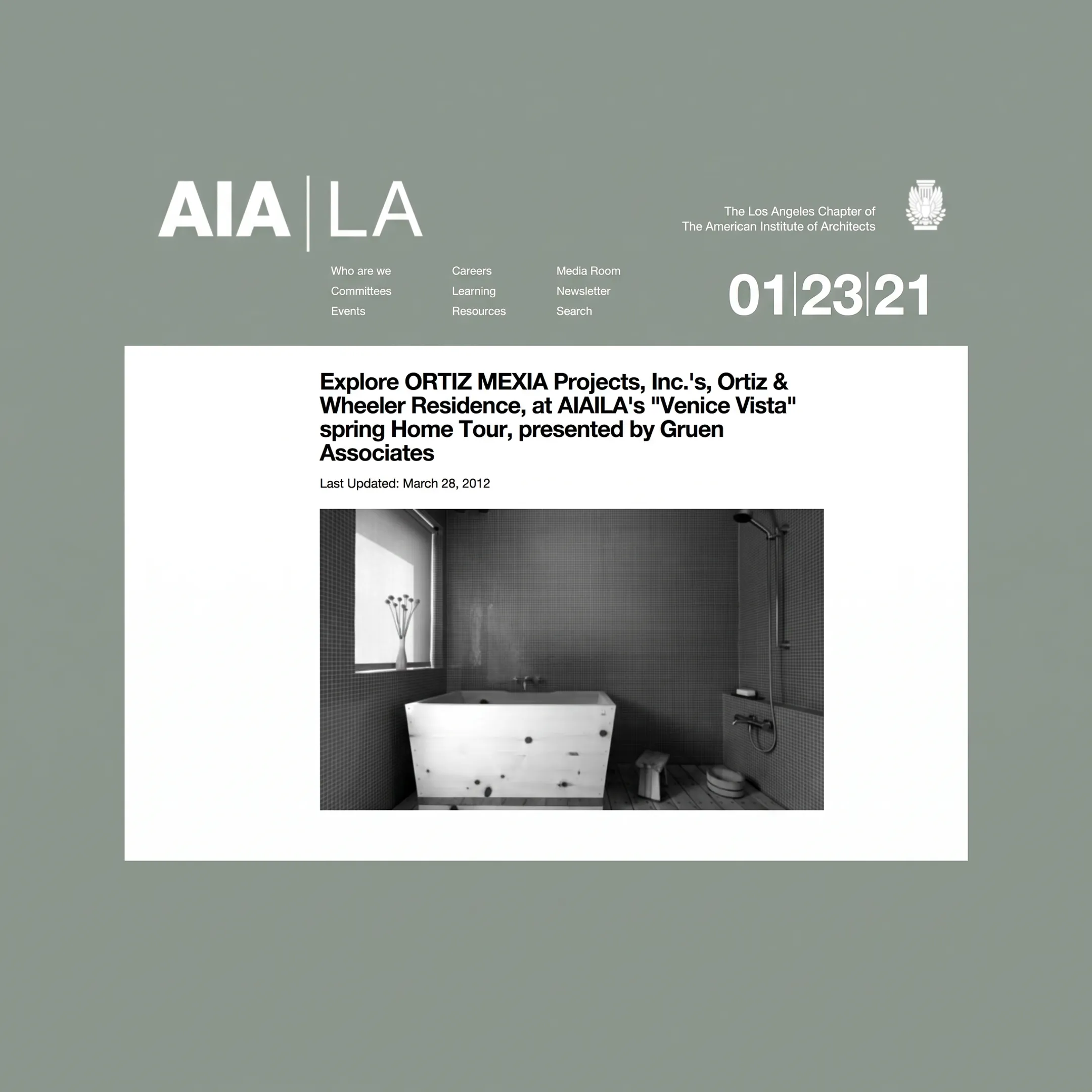 Detailed renovation plans and material samples on a design table