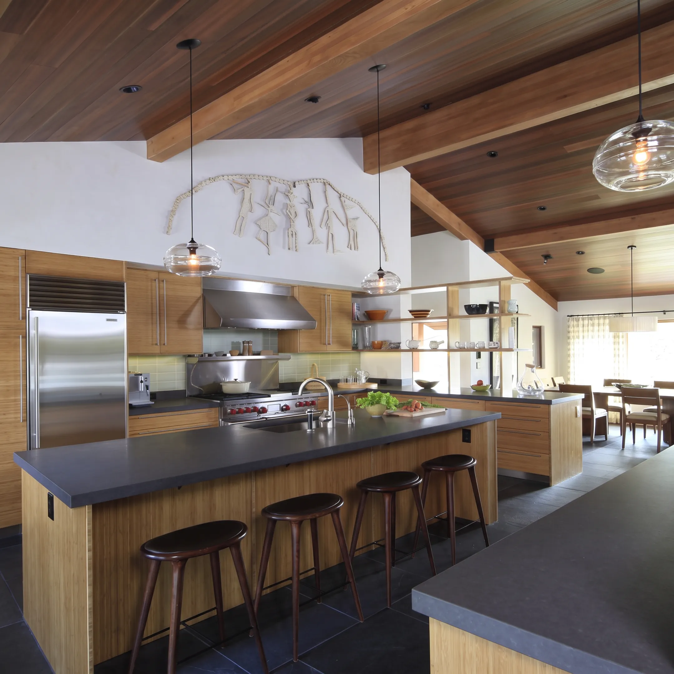 Custom kitchen cabinetry with carefully coordinated wood and painted finishes