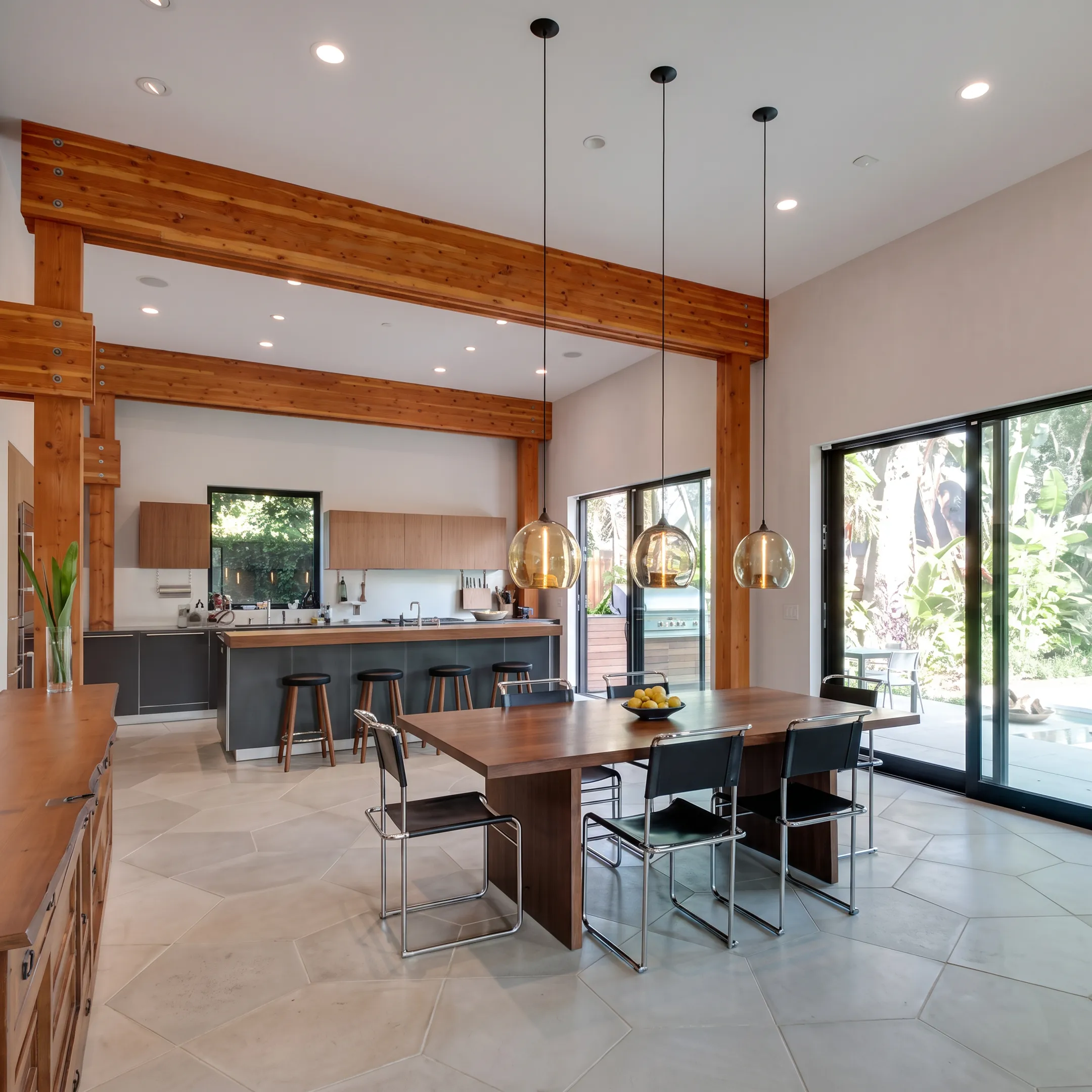 Architect and homeowner discussing a detailed remodeling budget