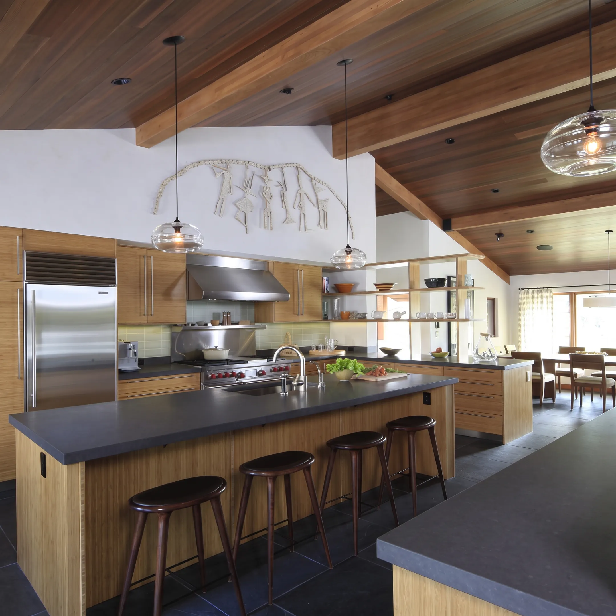 Architect reviewing kitchen remodel plans with homeowner