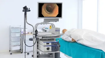 Modern video endoscope system showing CCD sensor distal tip connected to processor monitor display