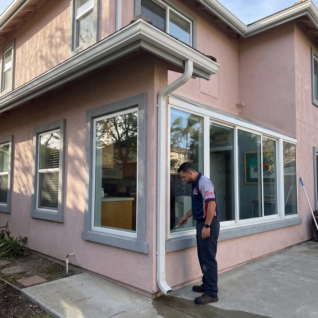 Clean windows and clear gutters on a home