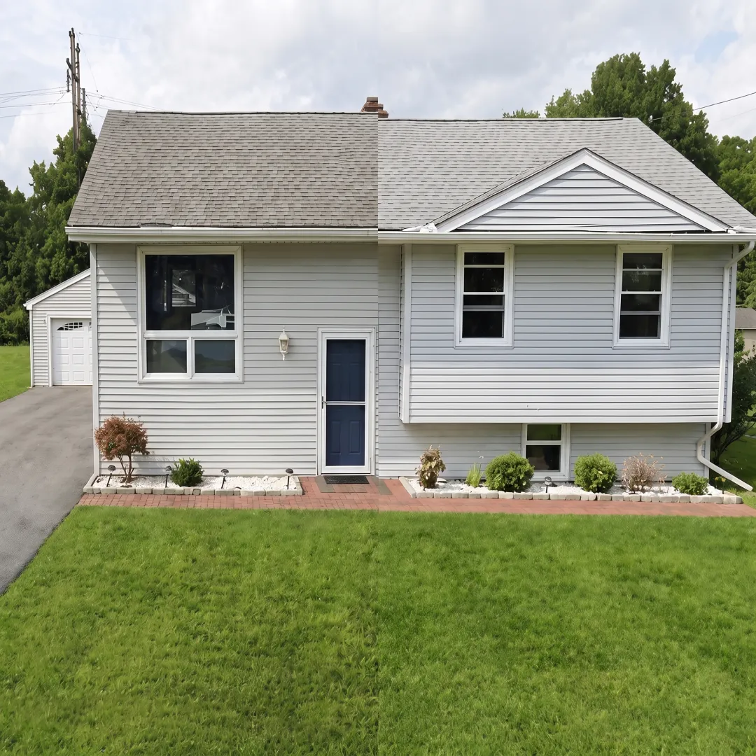 Clean residential windows and debris-free gutter system