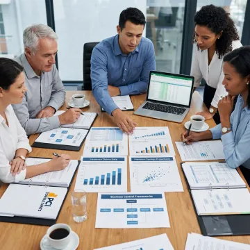 Consultants analyzing risk management workflow