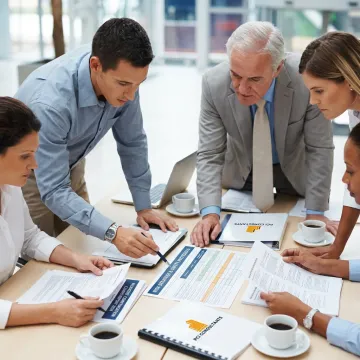 Consultants discussing workers compensation strategy