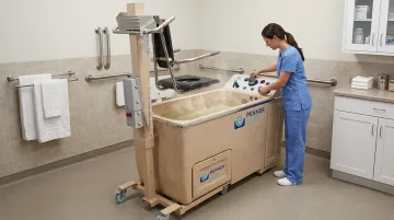 Penner Bathing therapeutic bathing system with height-adjustable transfer and safety features