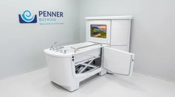 Height-adjustable therapeutic bathing system designed for safe assisted patient transfers
