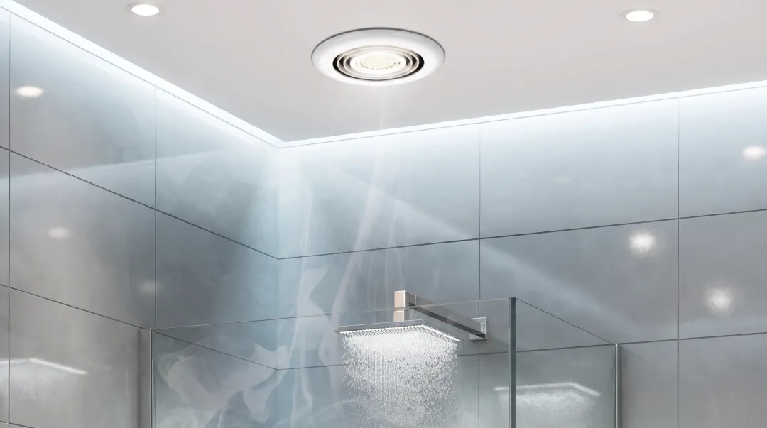 Bathroom exhaust fan installed on ceiling above wet room shower area