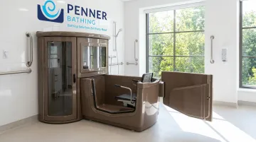 Penner Bathing healthcare bathing system with integrated transfer mechanism for long-term care