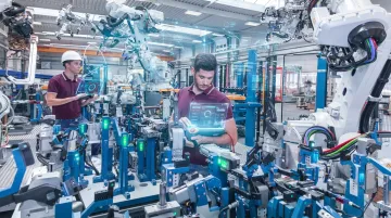 Industry 4.0 manufacturing floor with automated robotics and digital production systems