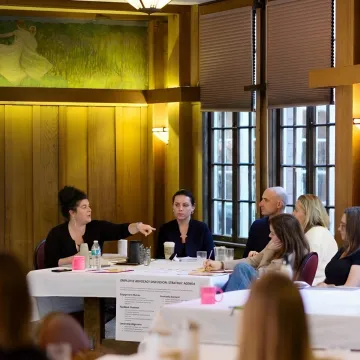HR leader advising executives in a meeting