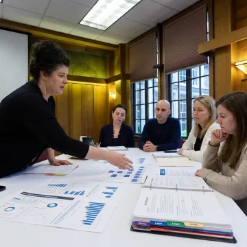 HR audit consultant reviewing workforce data