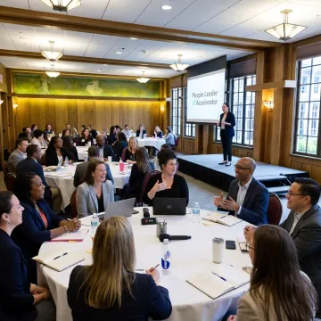 HR leaders networking at a leadership summit
