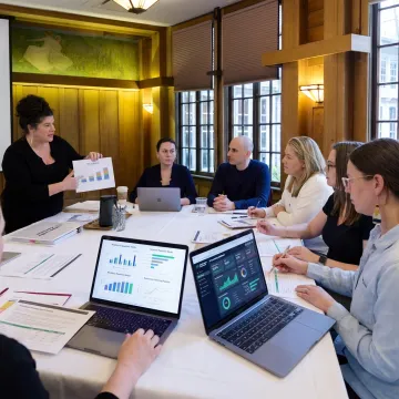 HR advisors reviewing people strategy dashboards