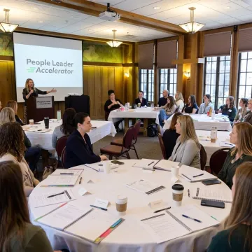 HR professionals attending a leadership development conference