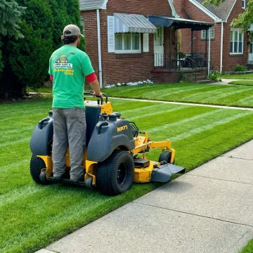 Professional lawn care service maintaining a healthy green lawn in Buffalo, NY
