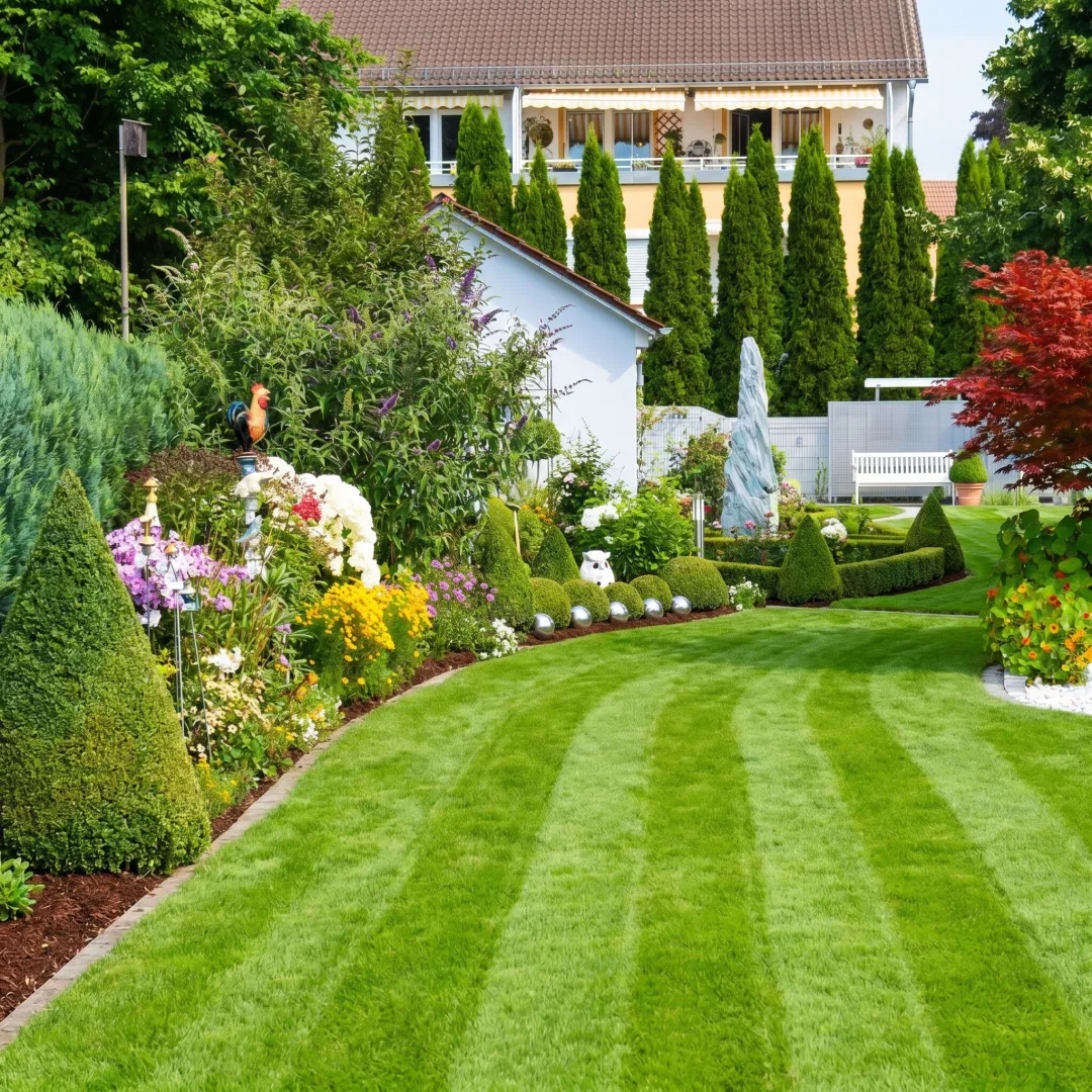 Freshly cleaned lawn and mulched beds in spring