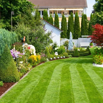 Freshly cleaned lawn and mulched beds in spring