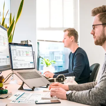 Revenue cycle team reviewing claims workflow