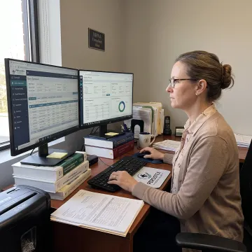 Medical billing specialist reviewing claims
