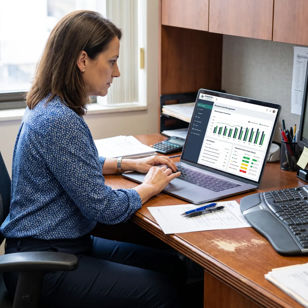 Billing professional analyzing reimbursement reports