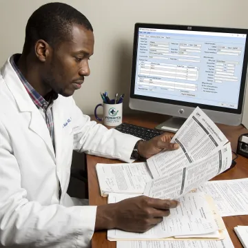 Coder checking medical claim details