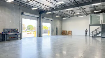Small bay industrial condominium units interior showing open warehouse floor space