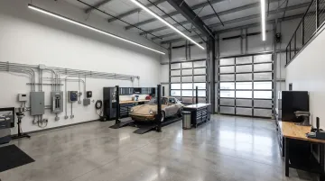 Personal Warehouse collector storage unit interior showing LED lighting lifts and electrical infrastructure
