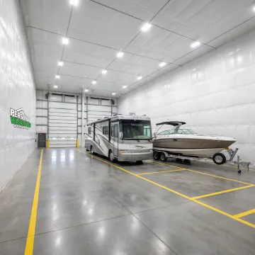 Boat and RV stored inside secure insulated facility