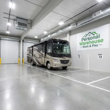 RV parked inside enclosed storage unit