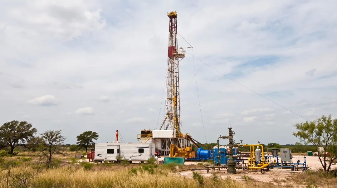 Natural gas drilling rig operating on East Texas well site